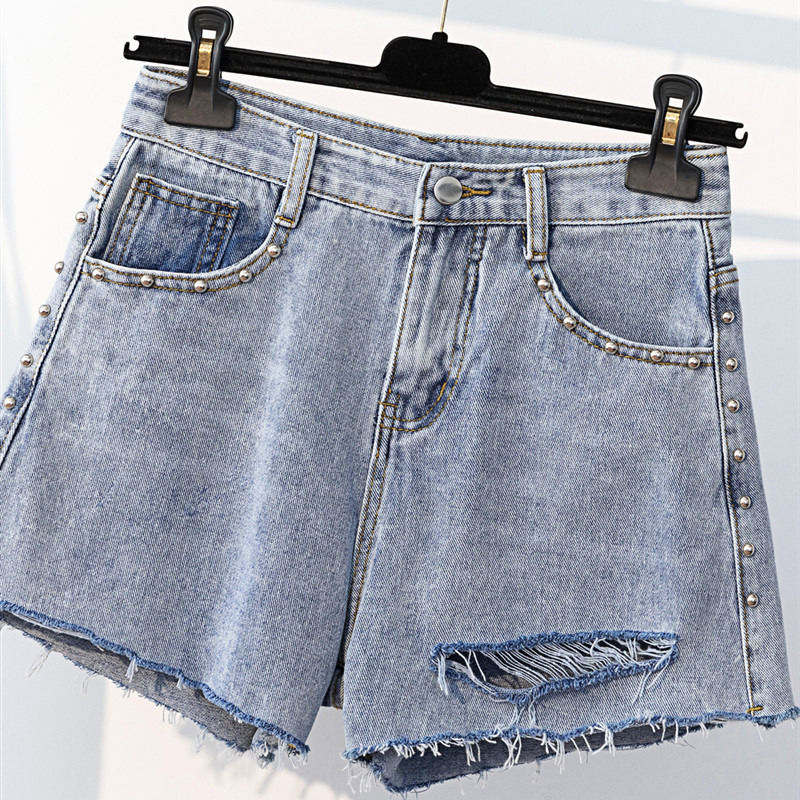 新款高腰破洞釘珠毛邊牛仔短褲