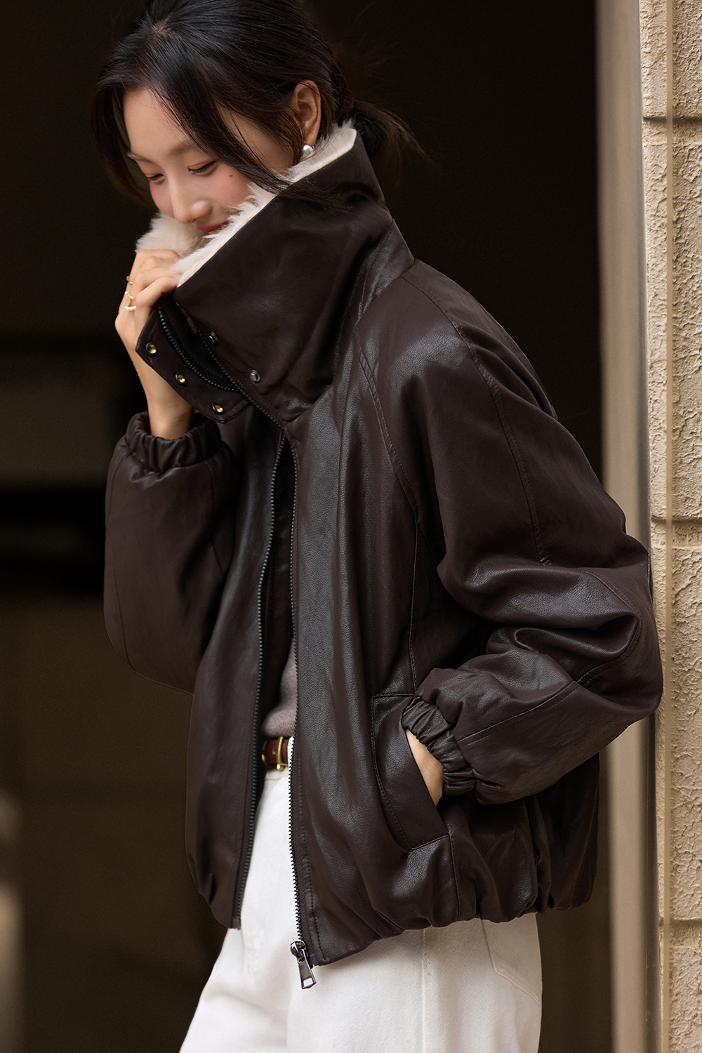 Fur - collared leather jacket