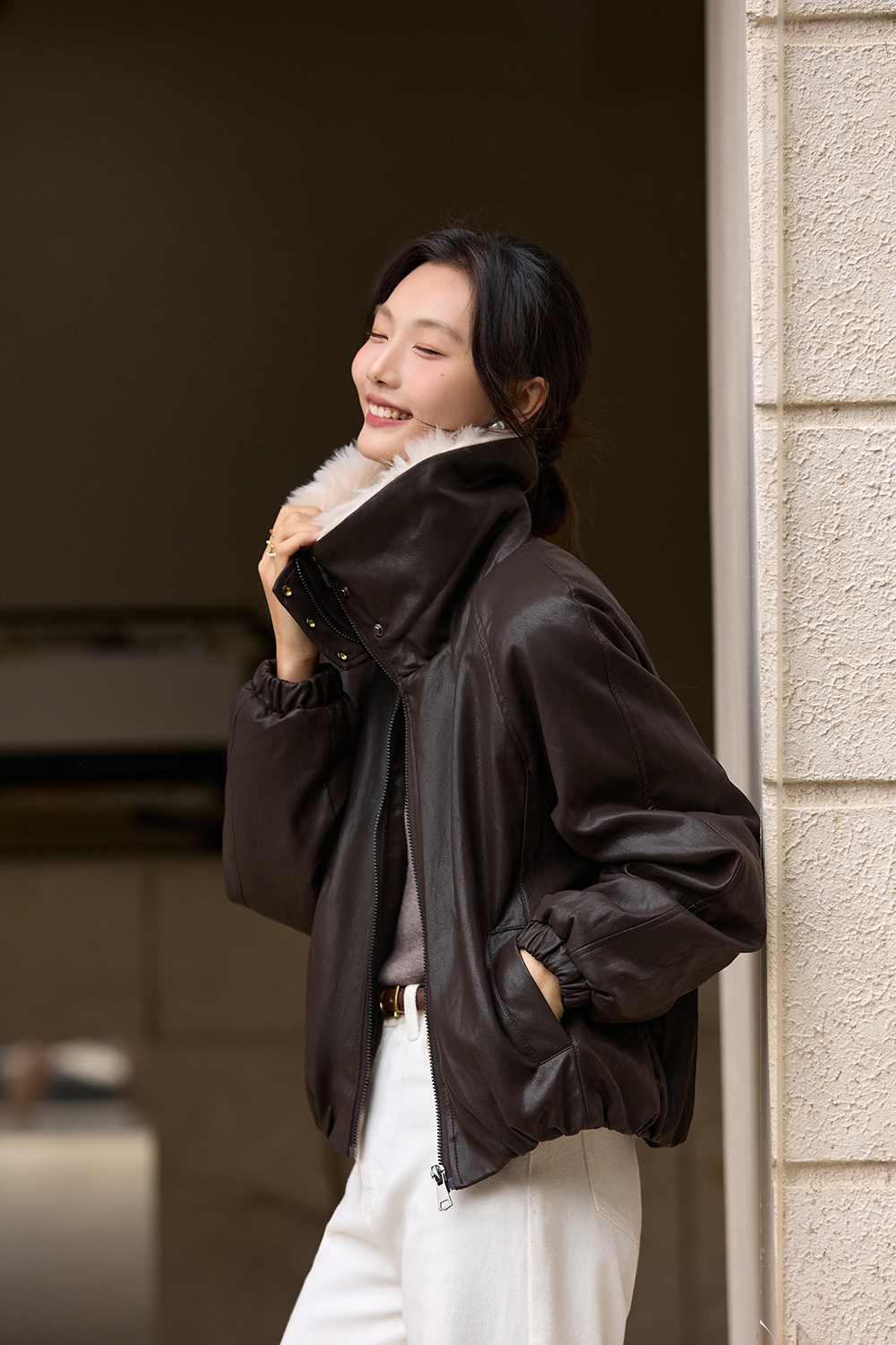 Fur - collared leather jacket