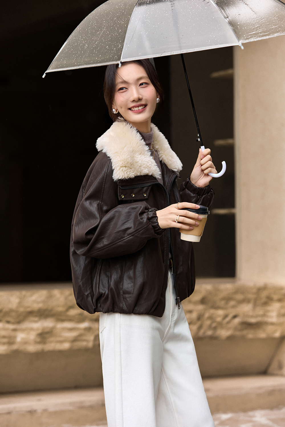 Fur - collared leather jacket