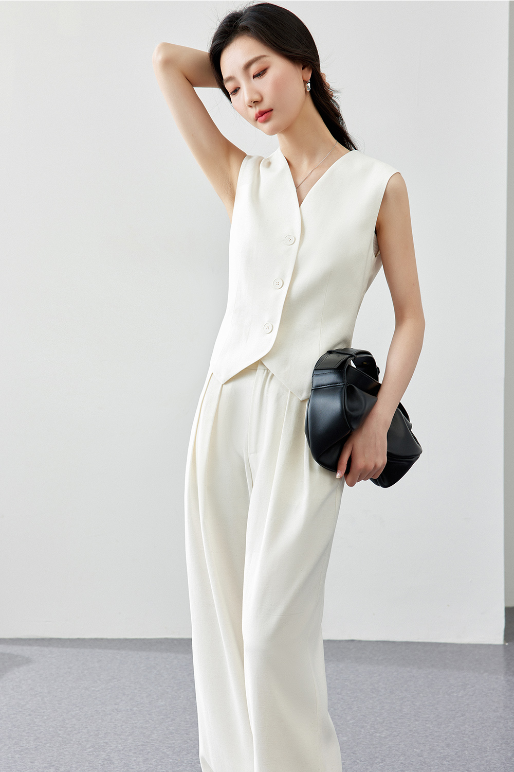 Sleeveless business commuting two-piece set