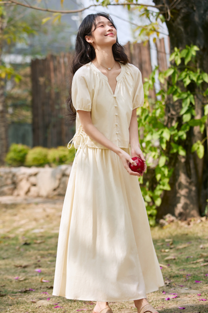 Gentle Beige Two-Piece Skirt Suit