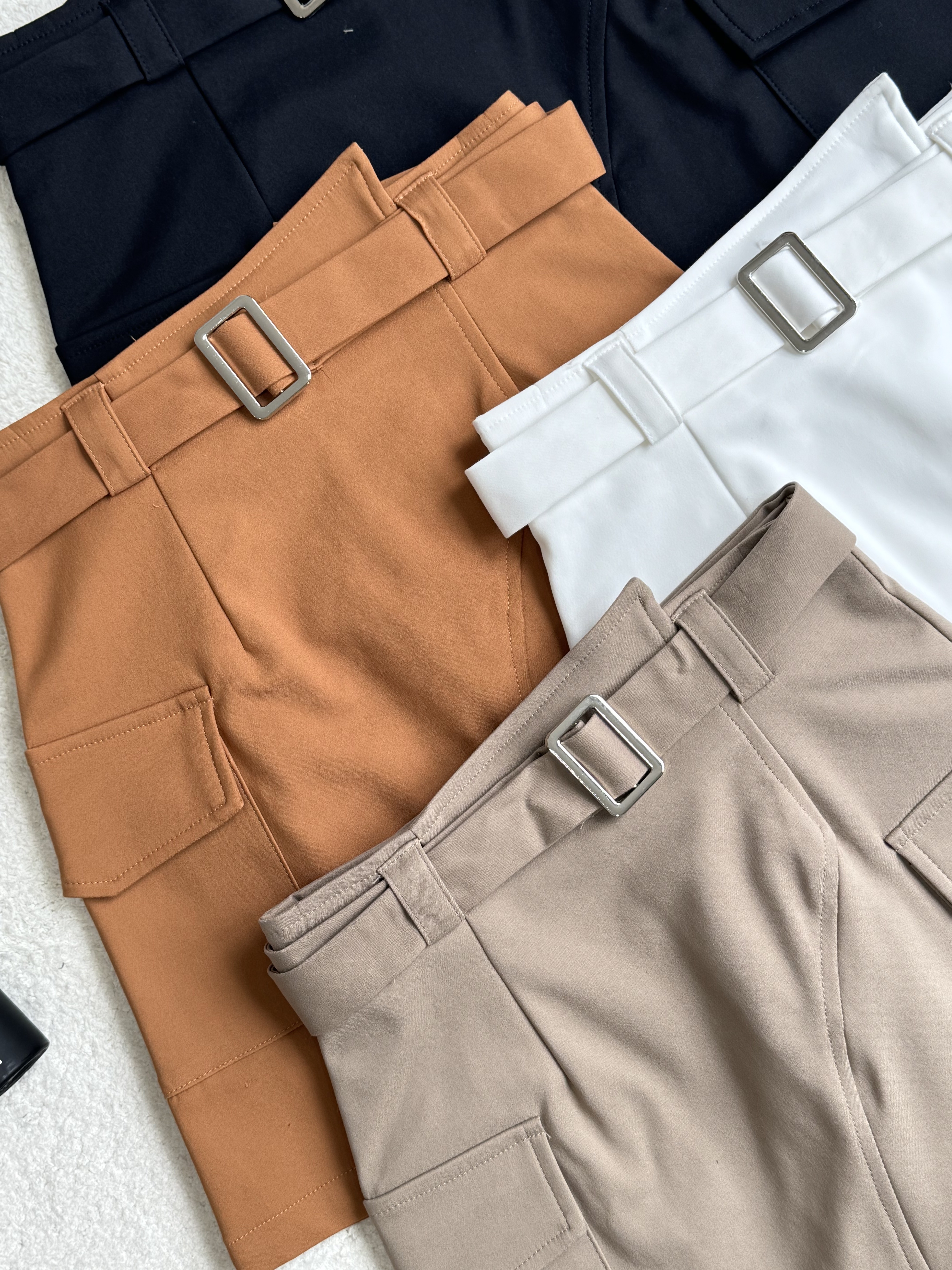 腰间不规则设计裙