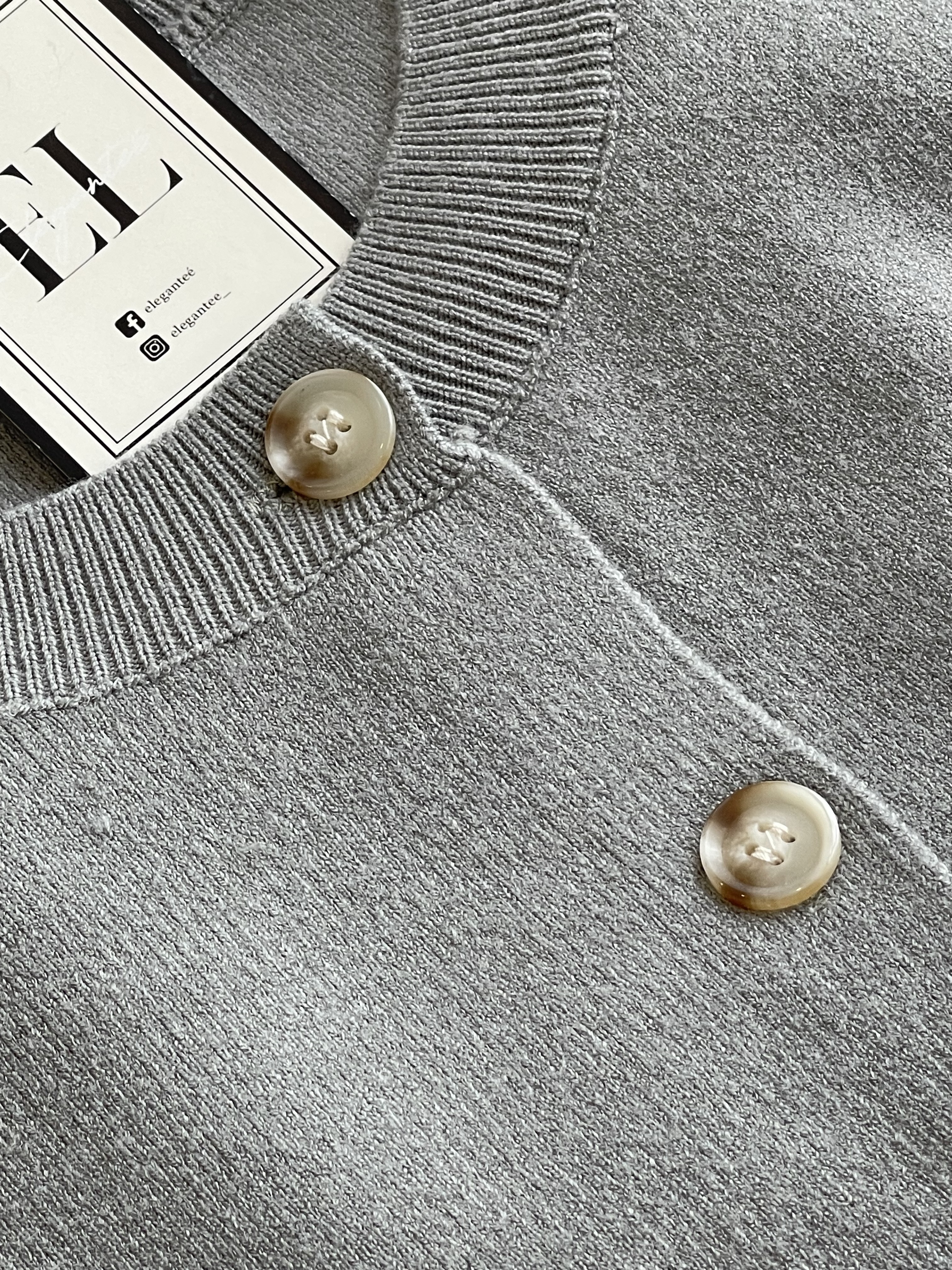 针织短袖琥珀纽外套