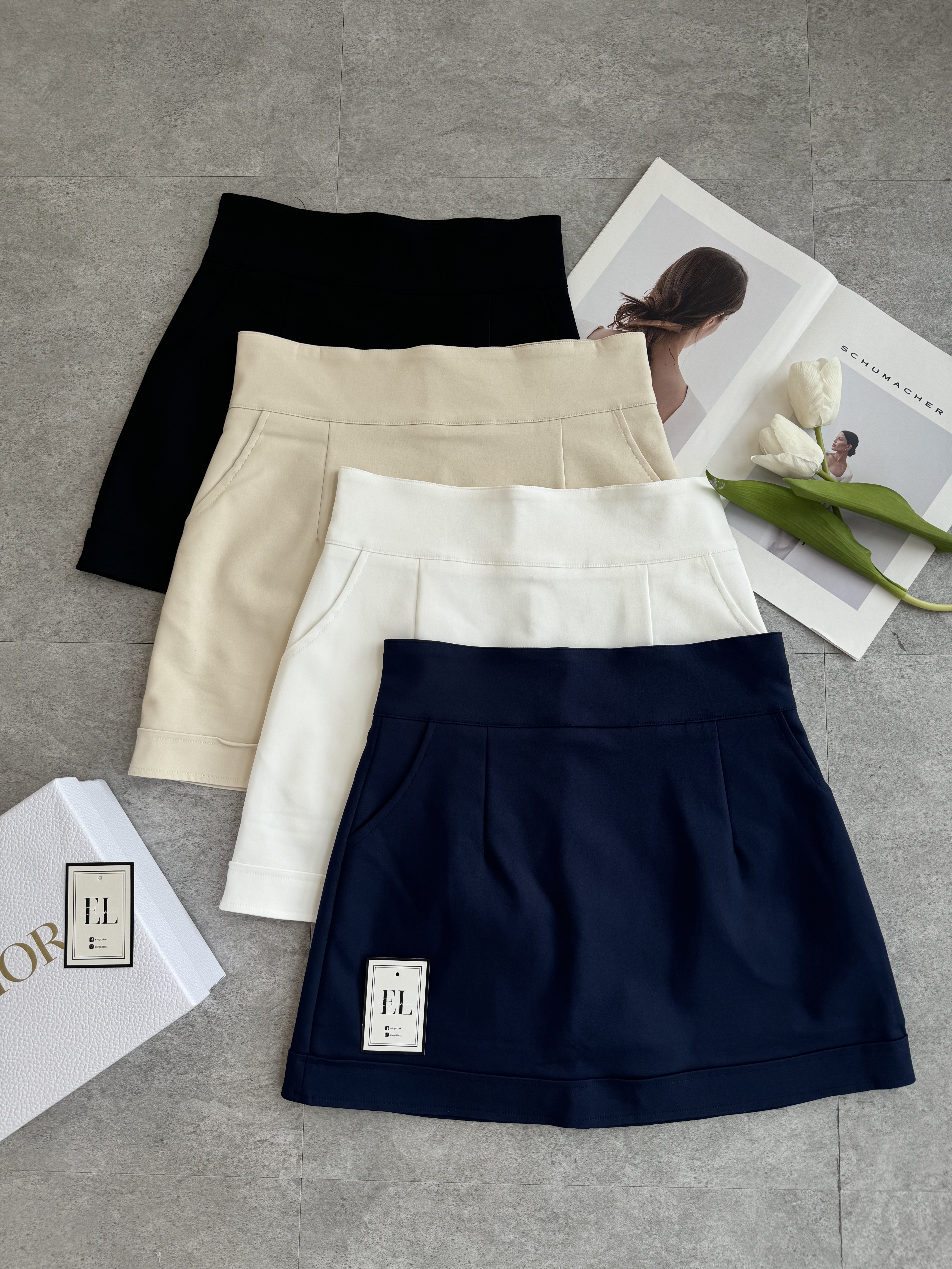 厚腰线下摆卷边短裙