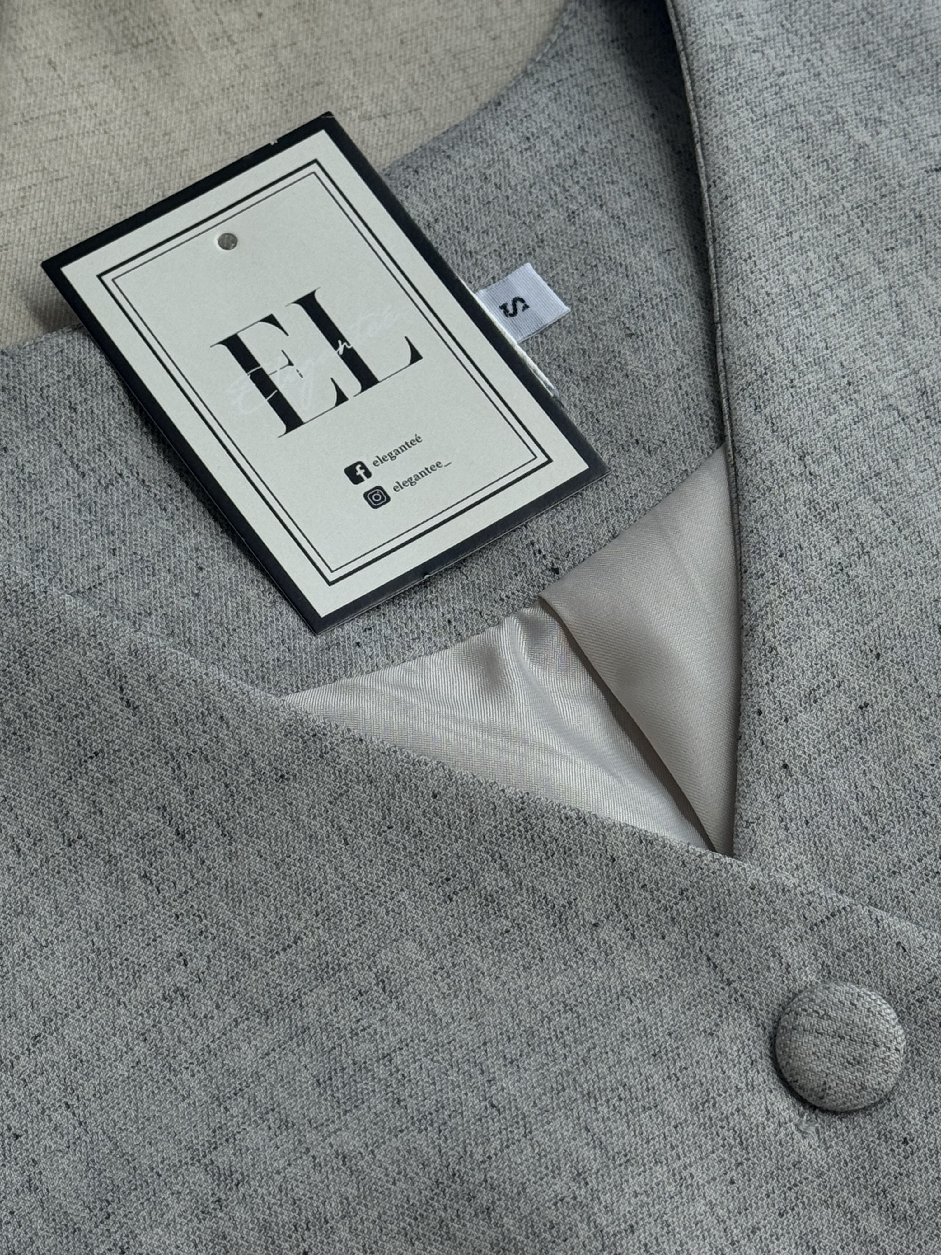 超美高级麻纹路歪扭设计马甲