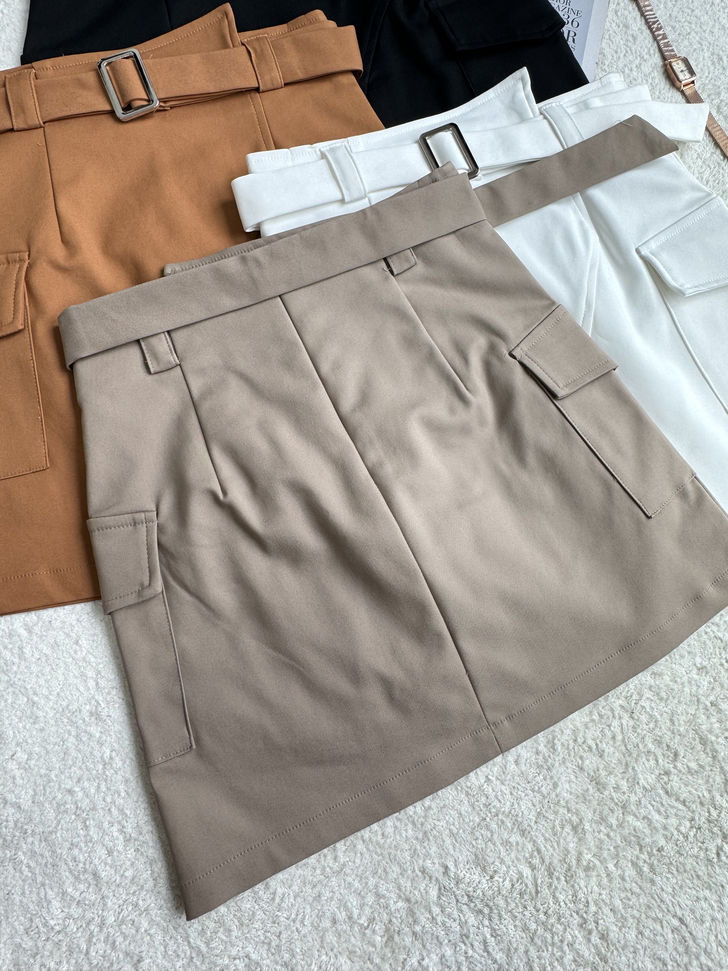 腰间不规则设计裙