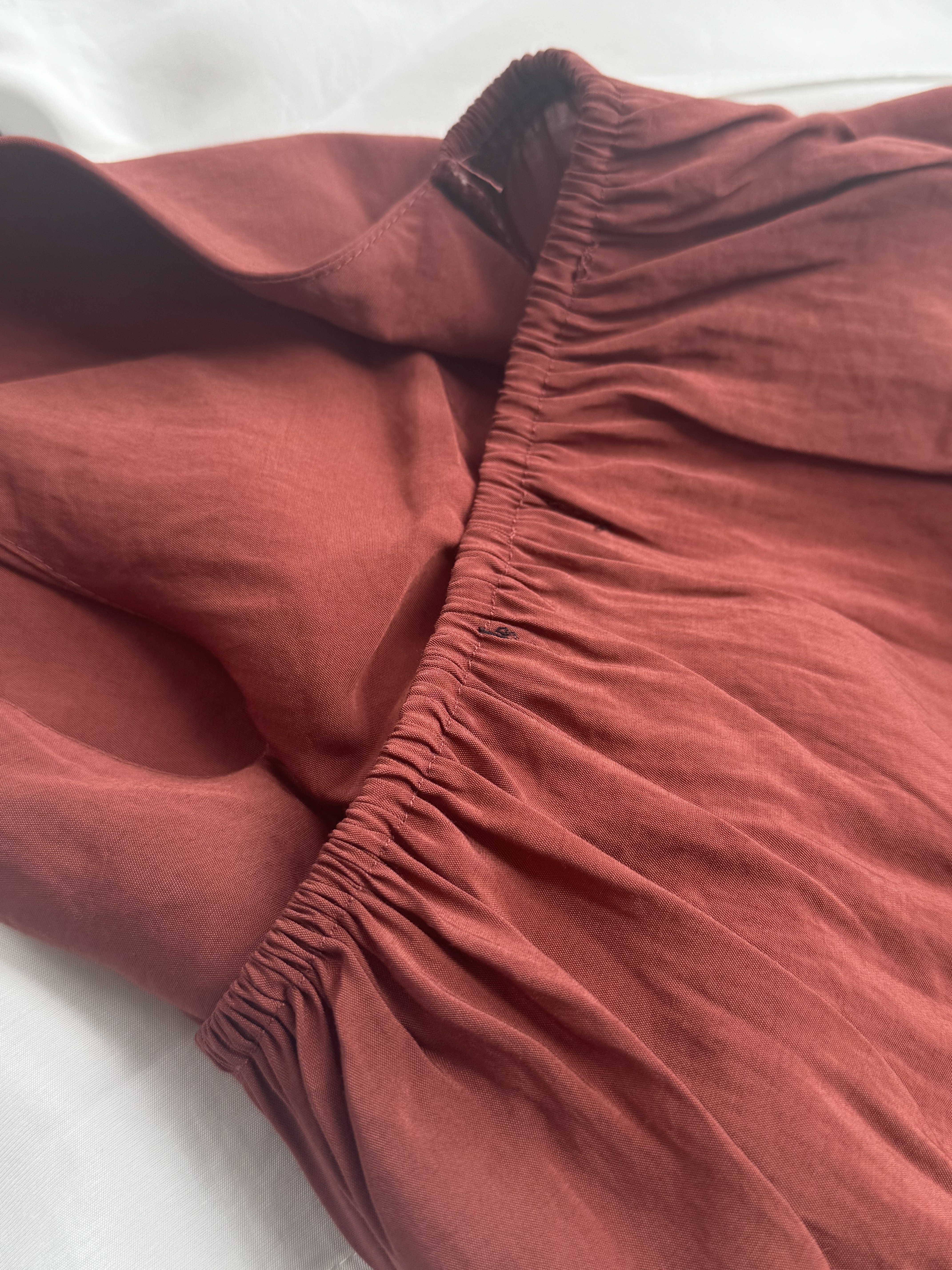 度假风长条带挂脖V领上衣