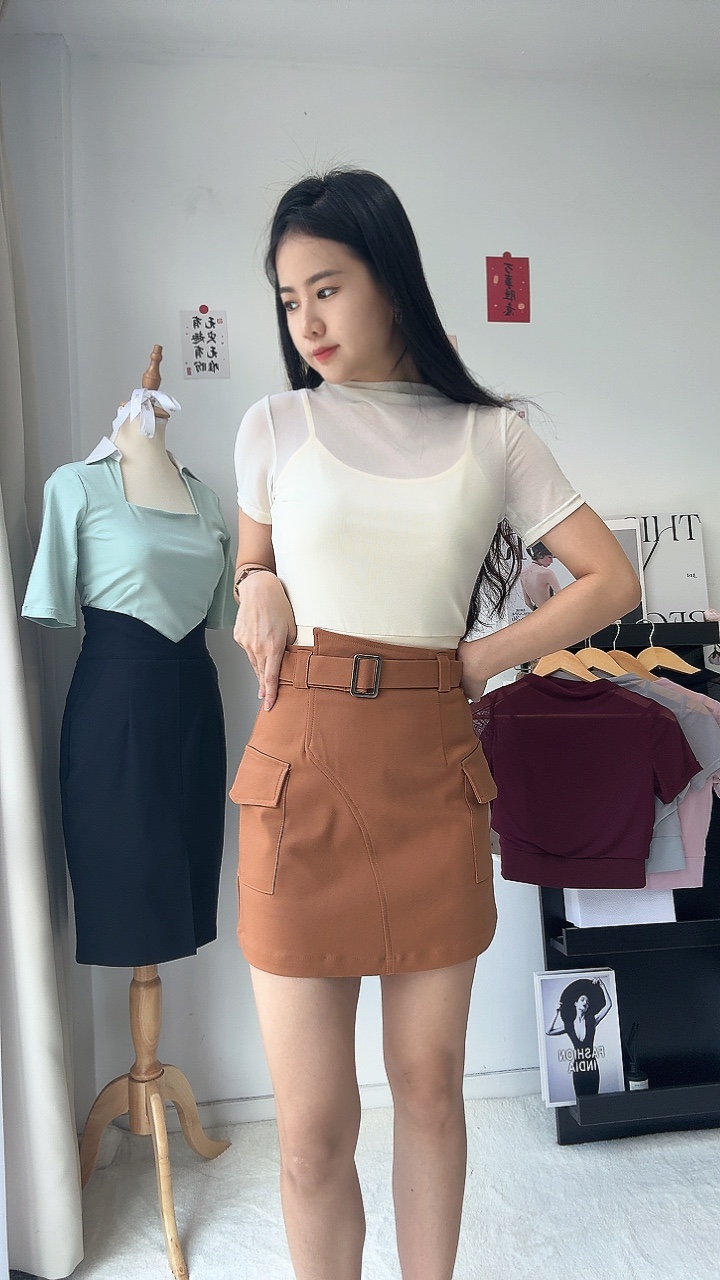 腰间不规则设计裙