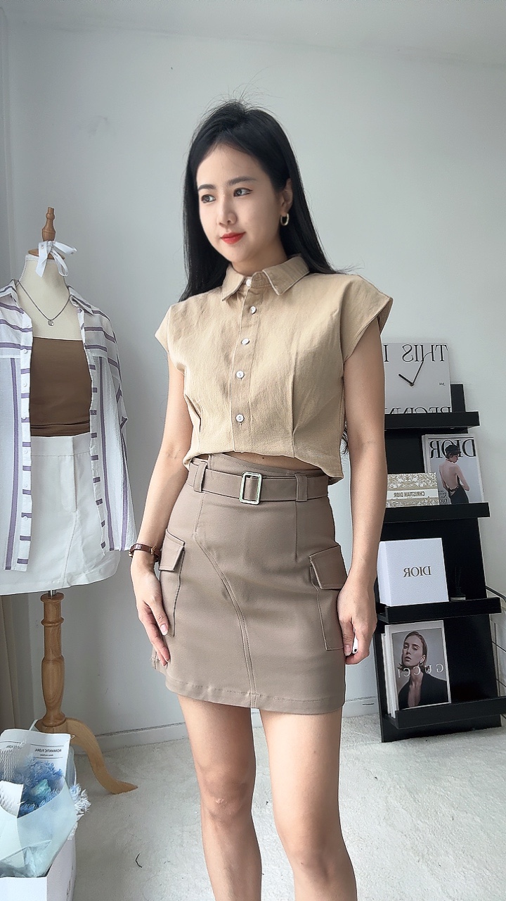 腰间不规则设计裙