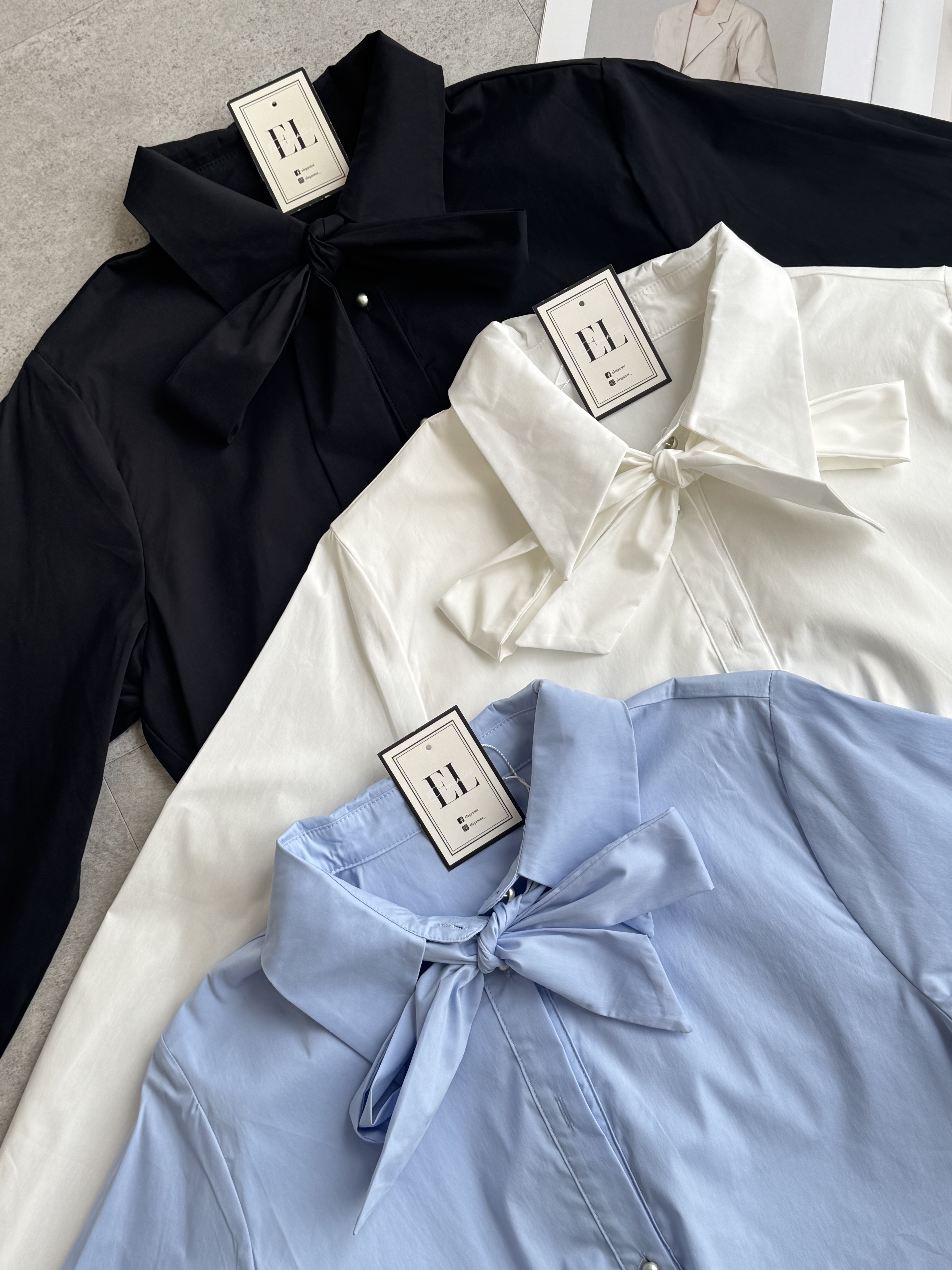 假两件内收腰蝴蝶结衬衫