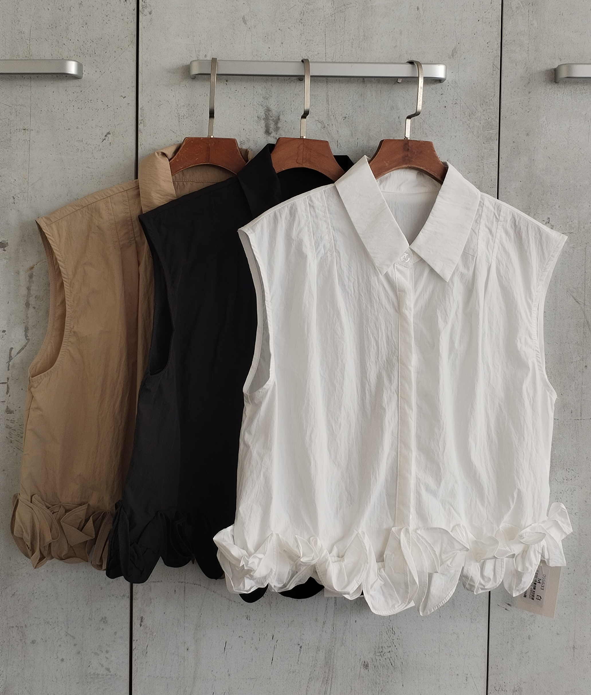 95533 Riano Ruffled Bottom Sleeveless Shirt (B 50cm; L 45cm)