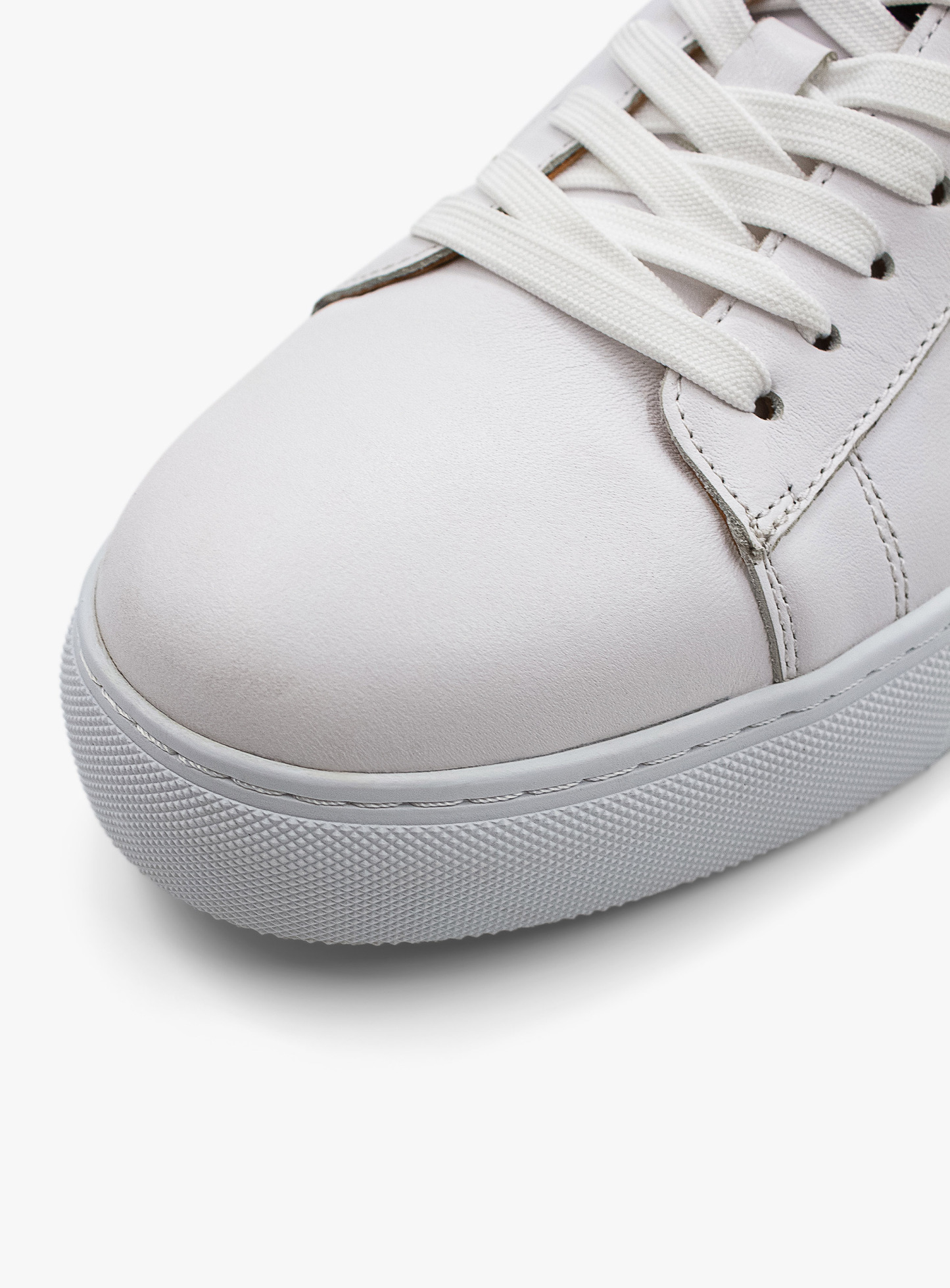 Elevated White Leather Sneaker