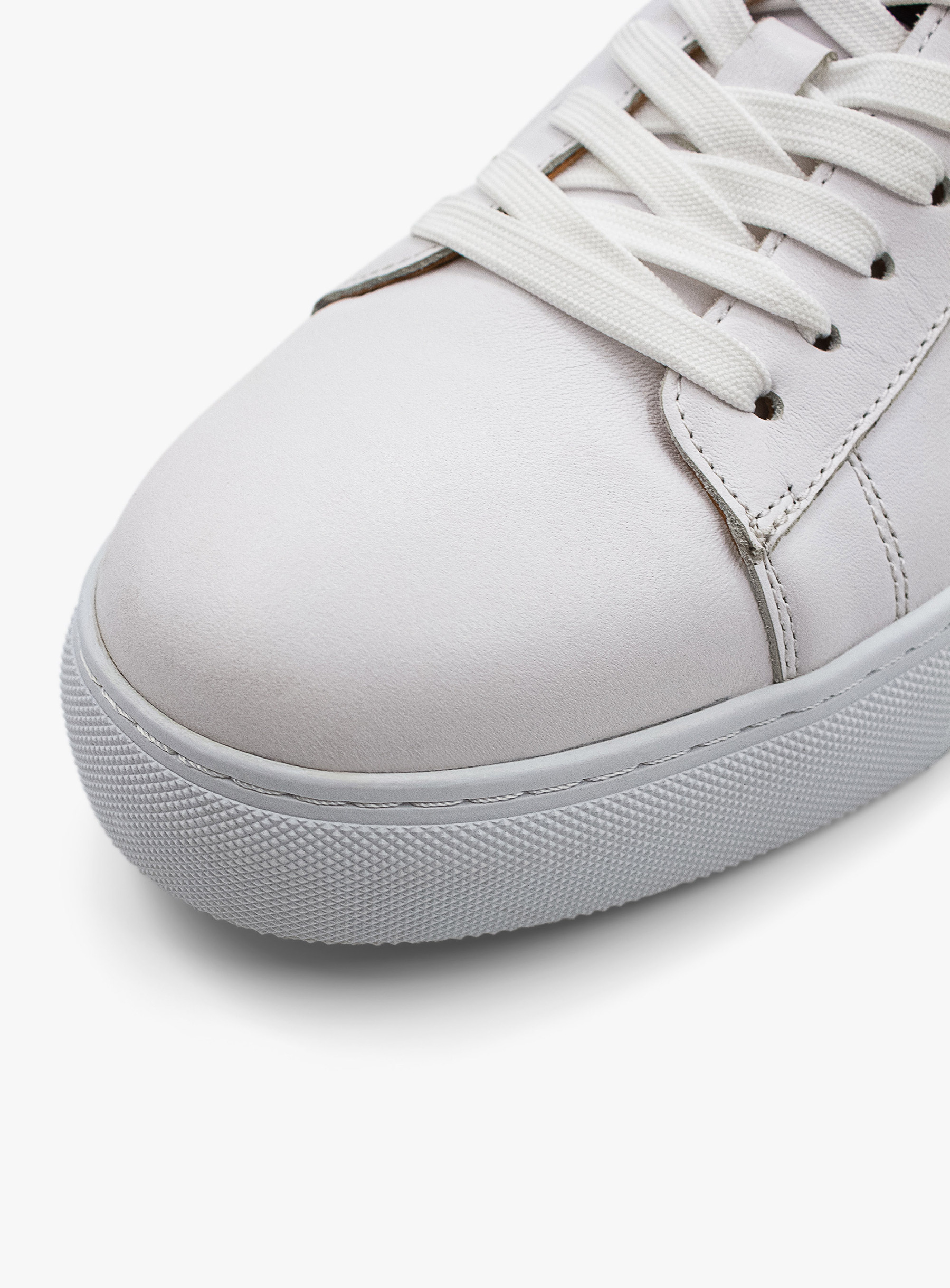 Elevated White Leather Sneaker