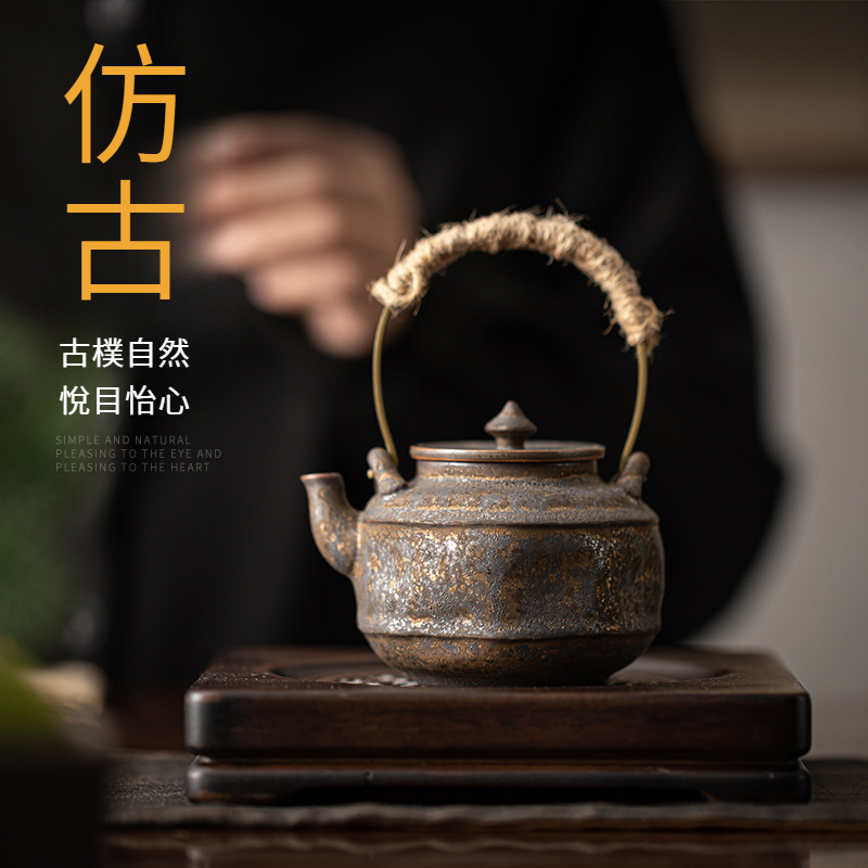 鎏金鐵釉提梁壺