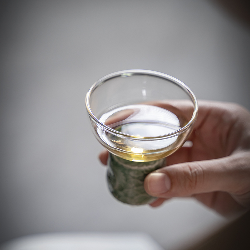 越窯梅子青瓷浮雕高足主人杯