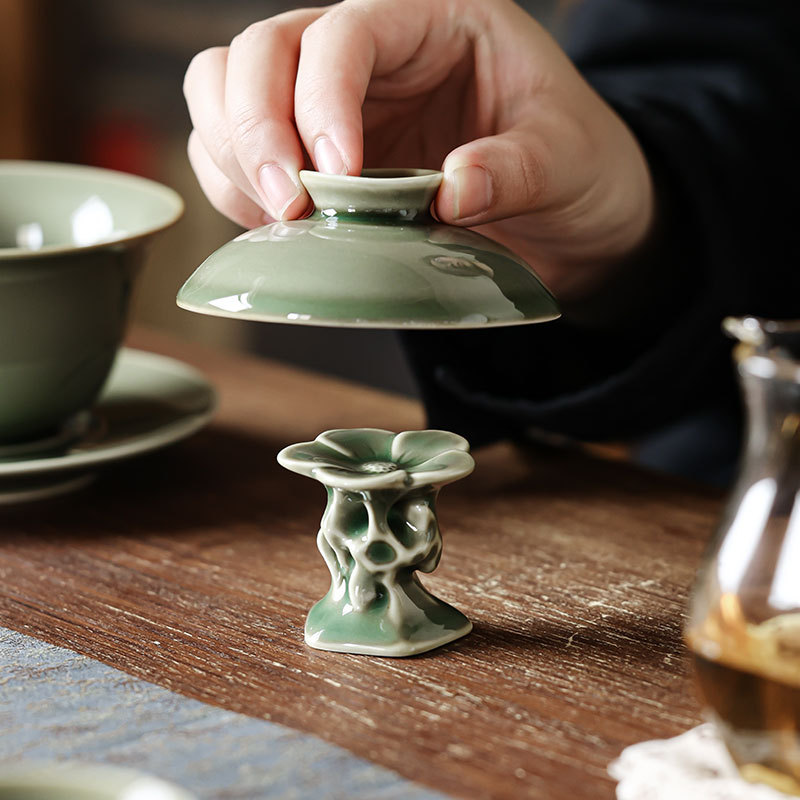 越窯青瓷石上花蓋置