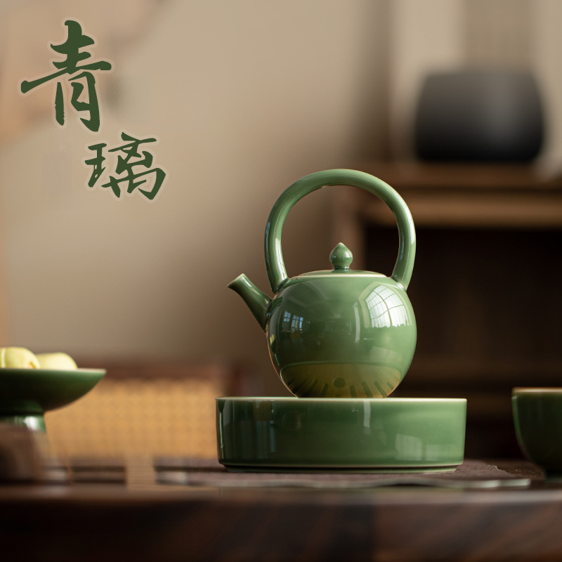 越窯青瓷圓月提梁壺