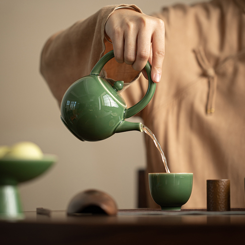 越窯青瓷圓月提梁壺