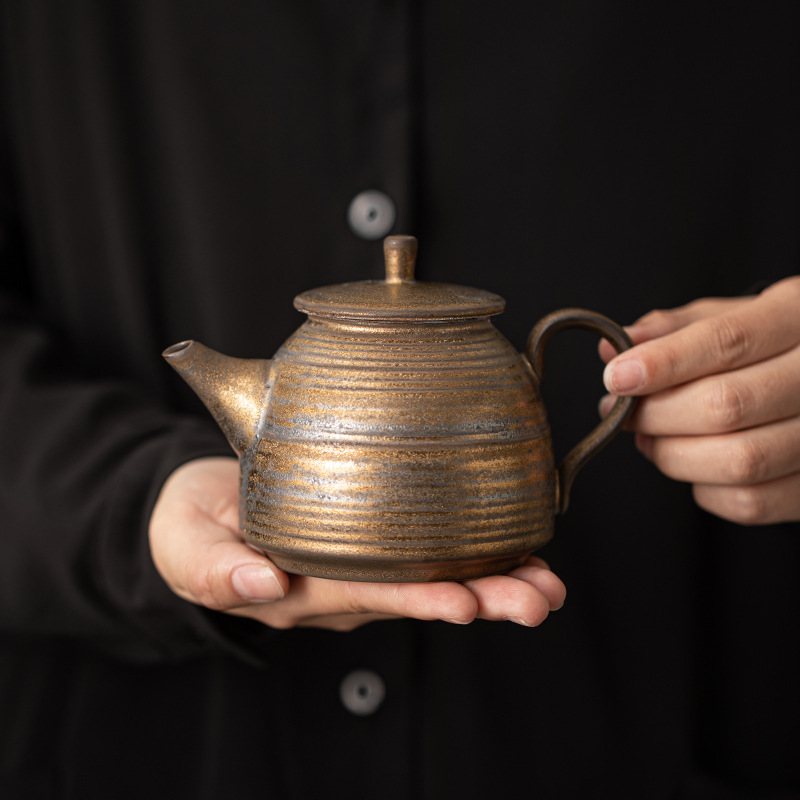 鎏金鐵釉提梁壺