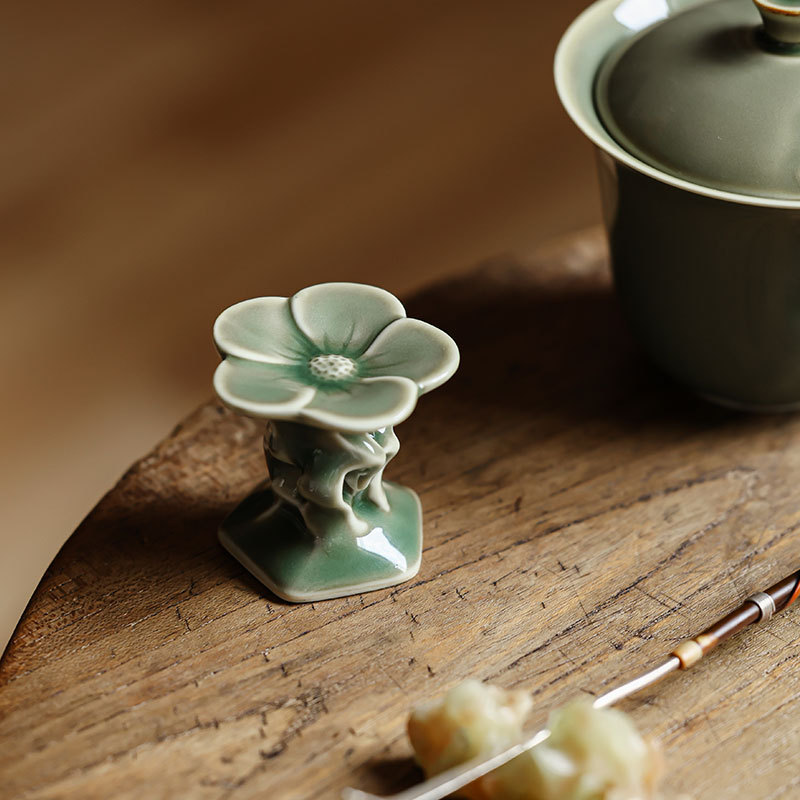 越窯青瓷石上花蓋置