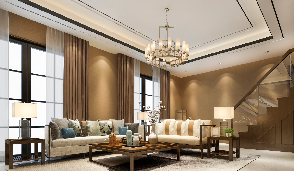 Cozy living and dining space with warm layered lighting and patterned decor.