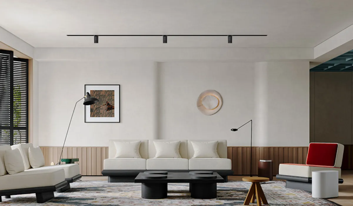 Modern living room with sleek black magnetic track lights for versatile lighting solutions
