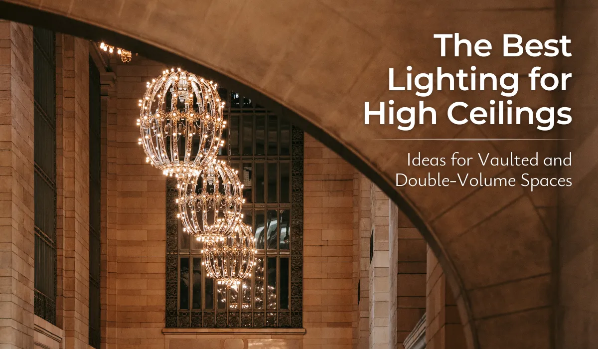 Grand chandelier installation for a vaulted ceiling in a large architectural space.