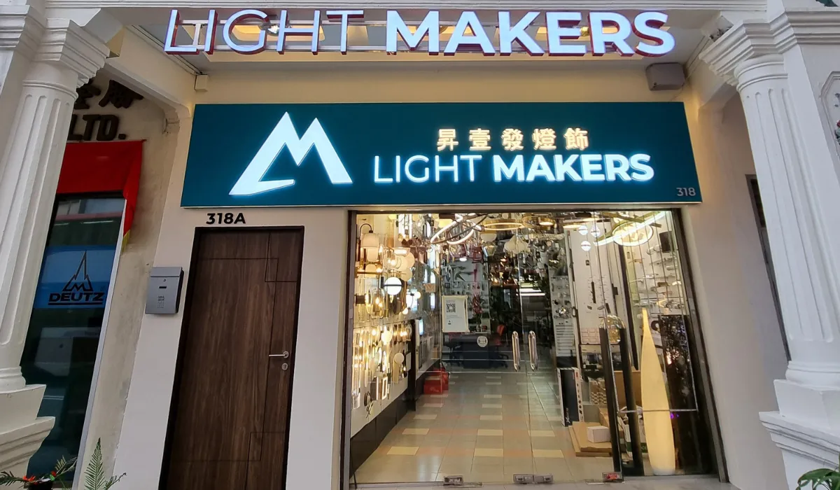 Customer receiving warranty support at Light Makers showroom