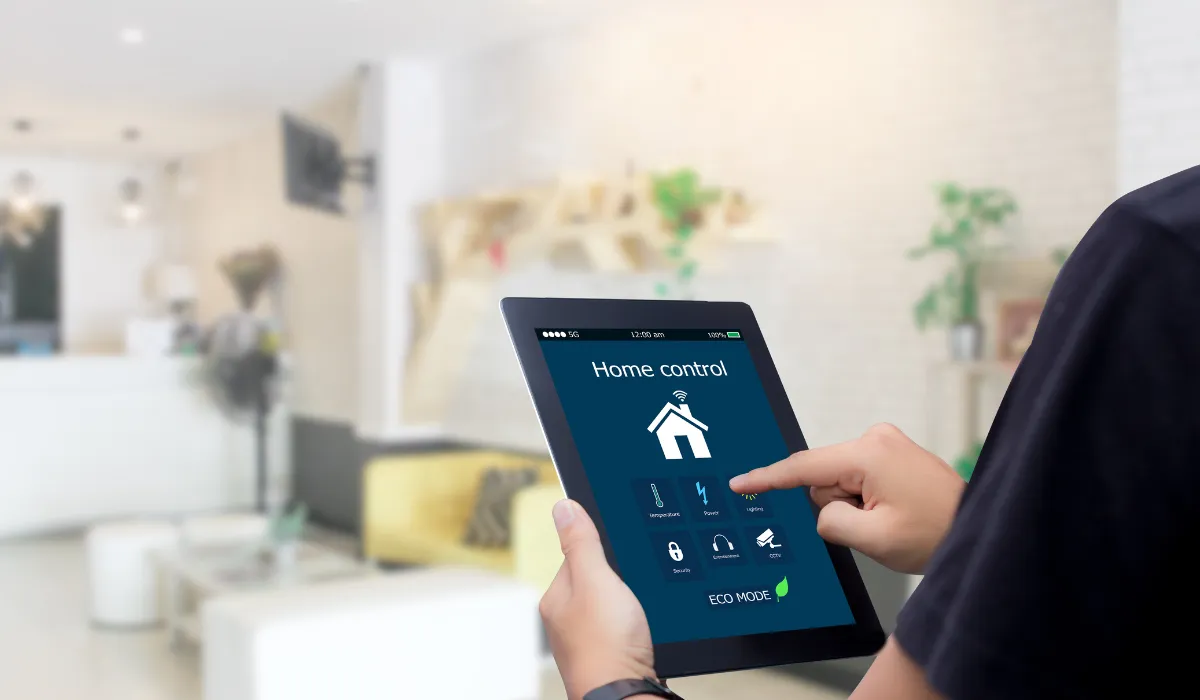 Tablet displaying home control panel for managing smart lighting, security, and energy use.