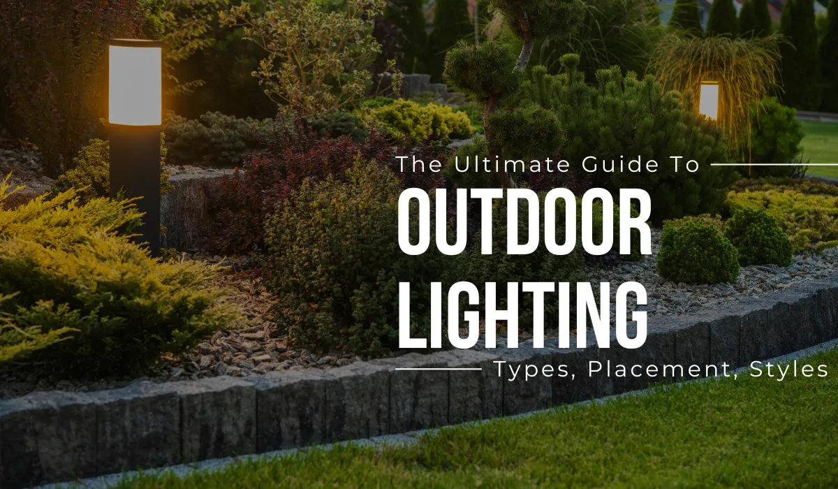 Modern outdoor bollard lights illuminating a landscaped garden pathway.