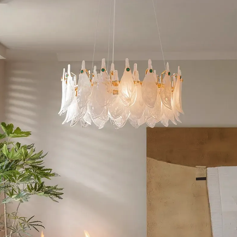 Modern white chandelier with green accent stones