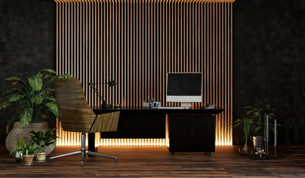 Home office with backlit wood paneling and desk lamp