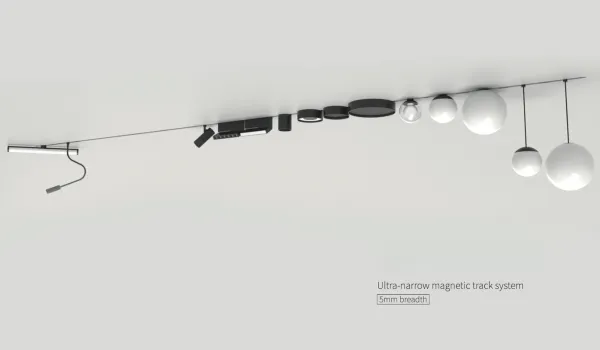 Ultra-slim magnetic track lighting system with multiple interchangeable light modules in various shapes and sizes on a 5mm breadth track.