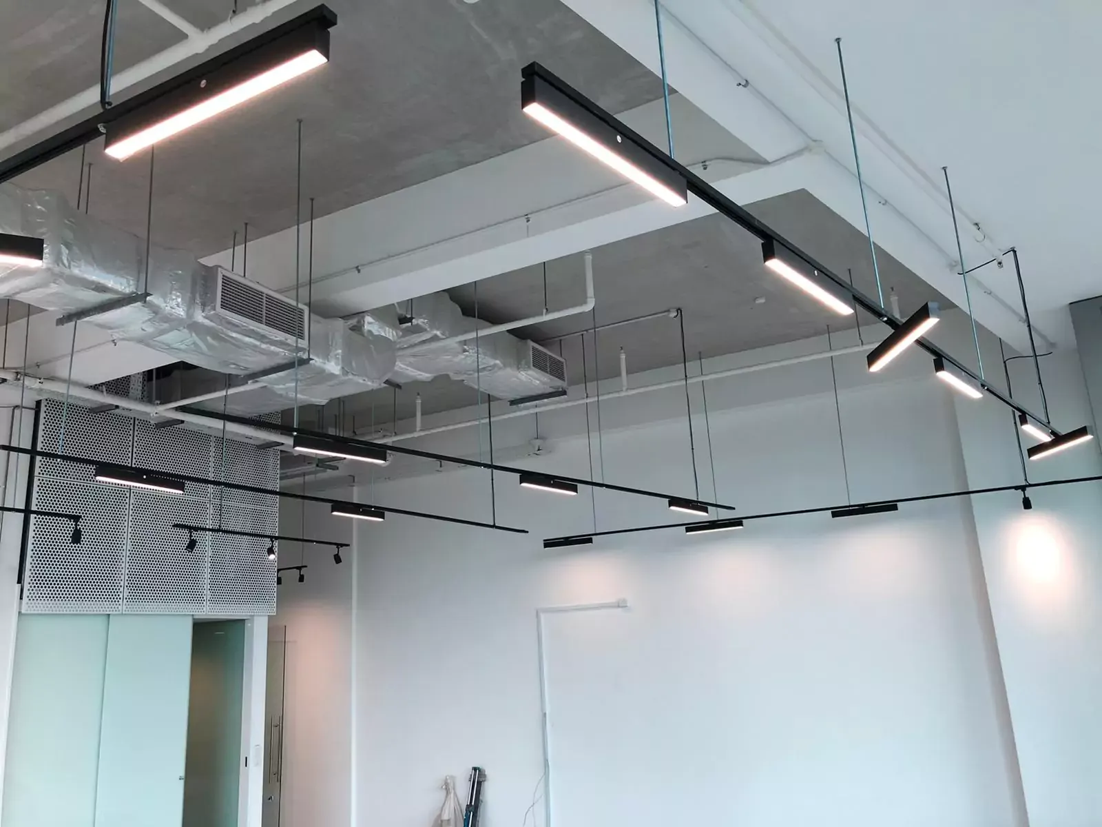 {"default":"Suspended Track Lights for Commercial Building. "}