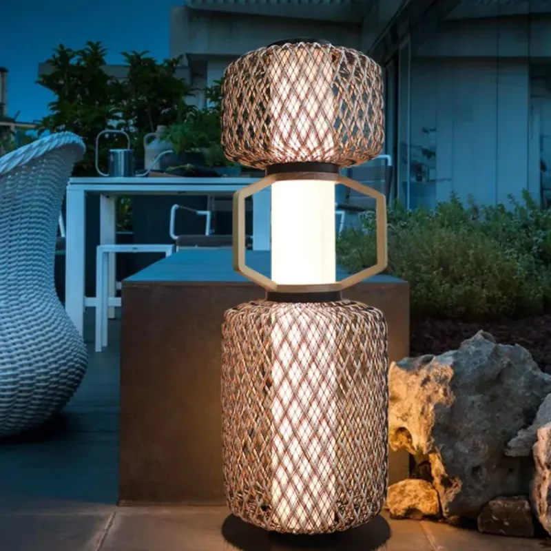 Brown rattan floor lamp in tropical living space.