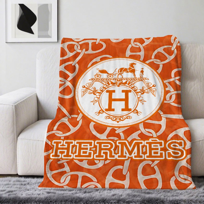 HERMES Hロゴ入り赤とベージュの毛布 HERMES Hロゴ入り赤とベージュの毛布