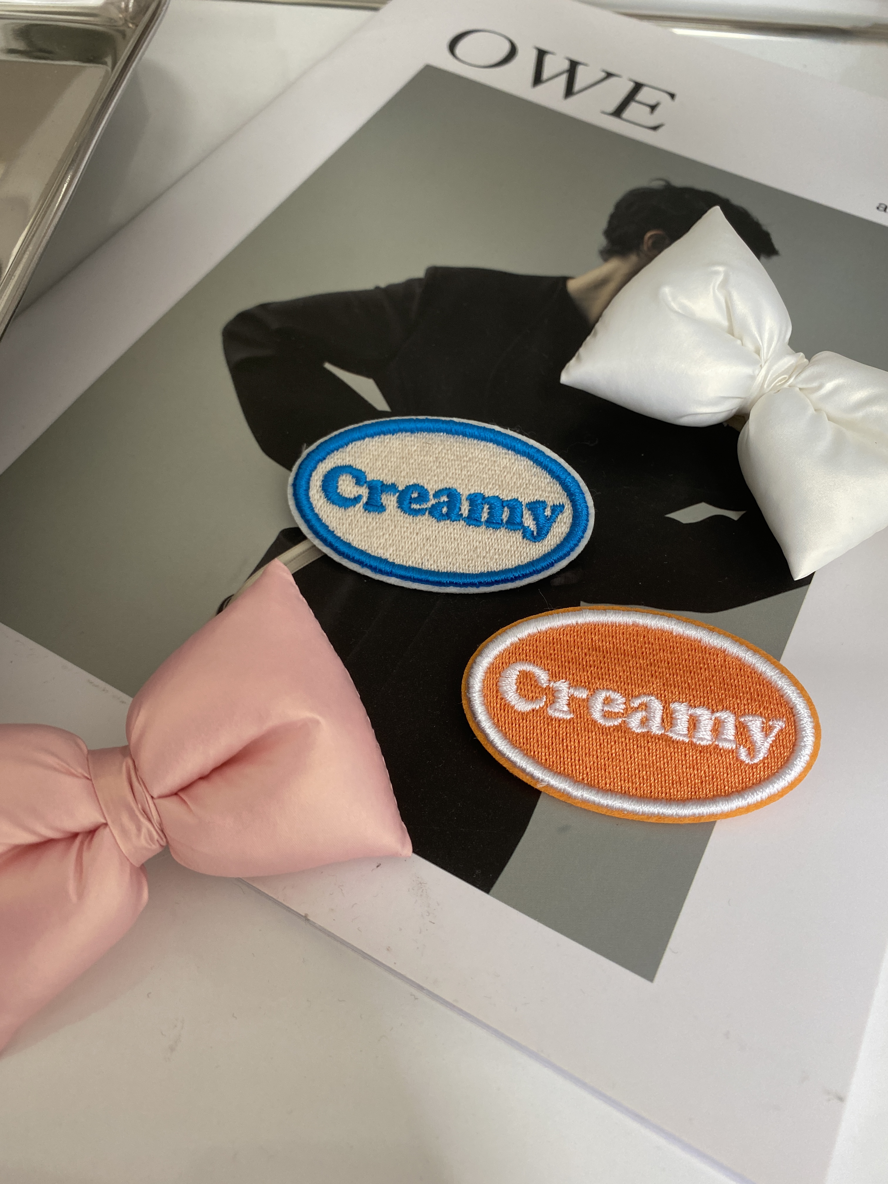 Pink / White puffy ribbon and "creamy" pin