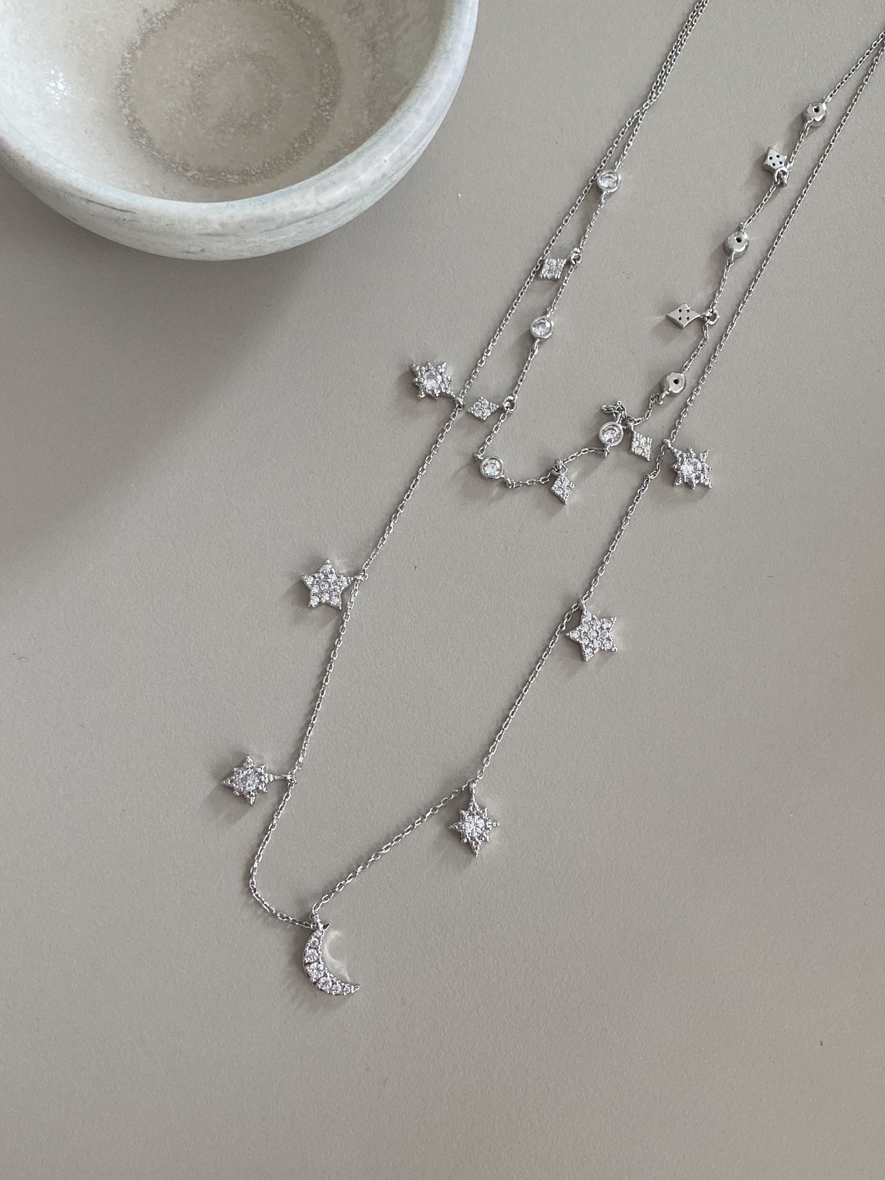 2 layered stars with cubic stones necklace