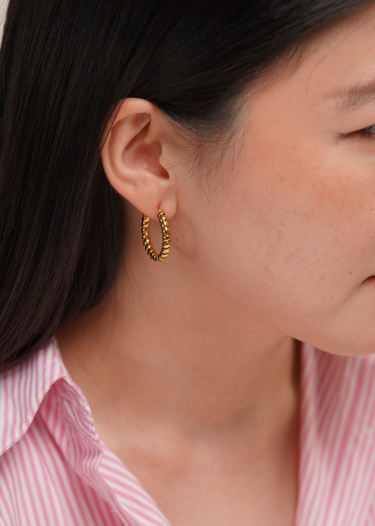 Ray Gold Twist Earrings