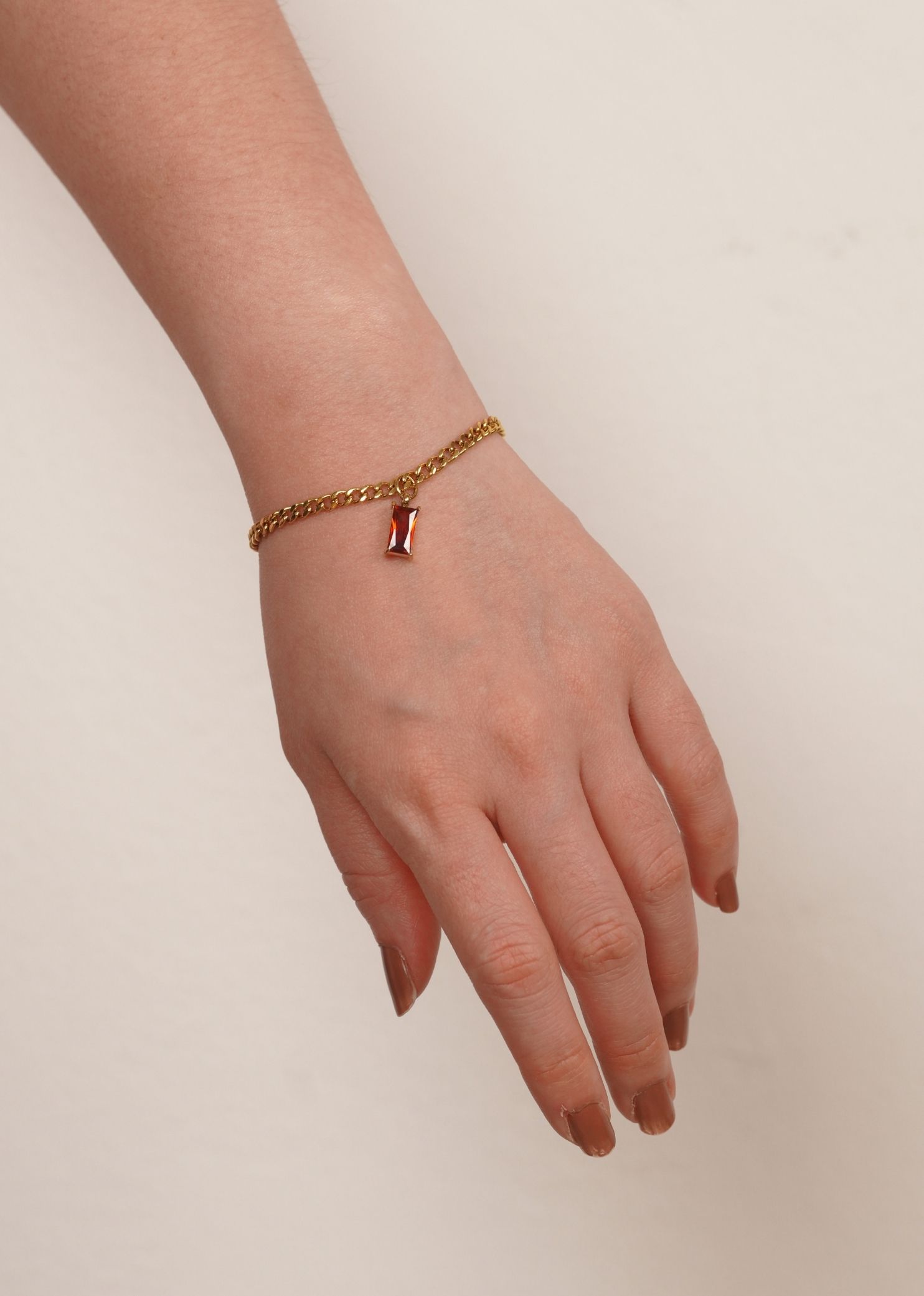 Verity Ruby Pendant Gold with Curb Chain Bracelet