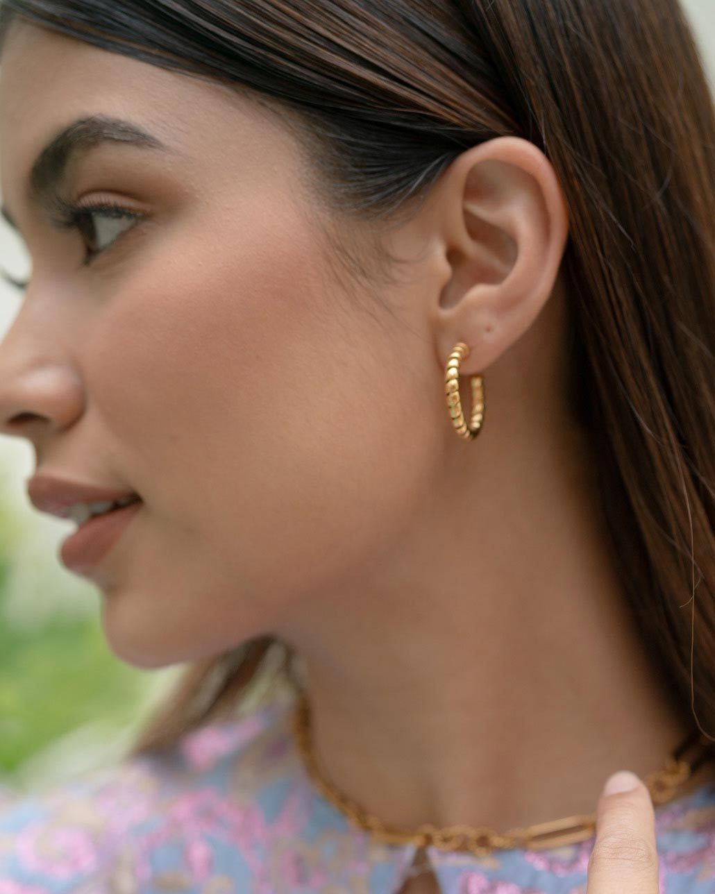 Ray Gold Twist Earrings