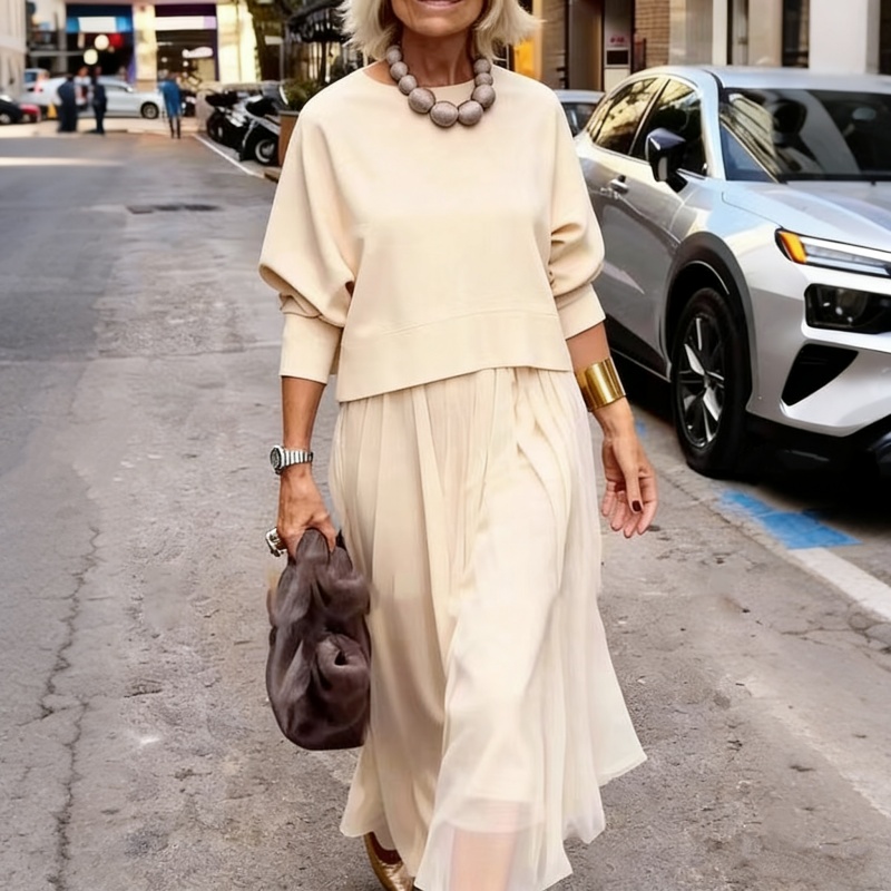 طقم من قطعتين من بلوزات نسائية بأكمام طويلة وفستان بلا أكمام