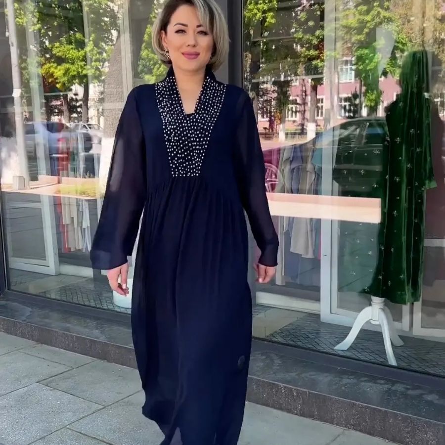 ⏳فستان نسائي أسود برقبة على شكل حرف V انسيابي👗✨
