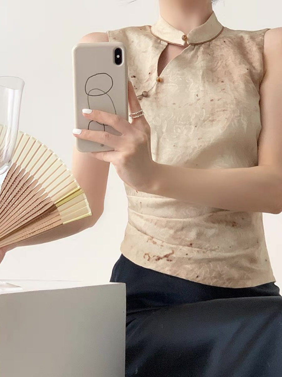 Xin Xin Sleeveles Oriental Top