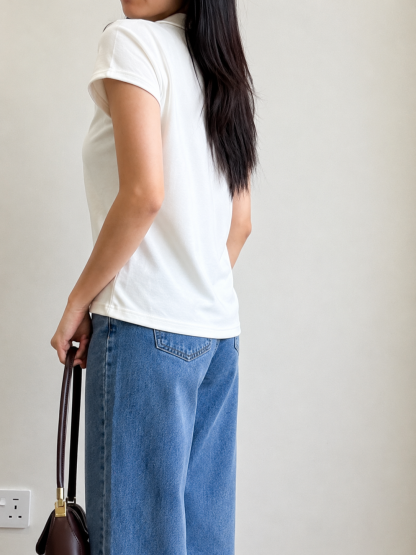 Neveah Buttoned Collar Top