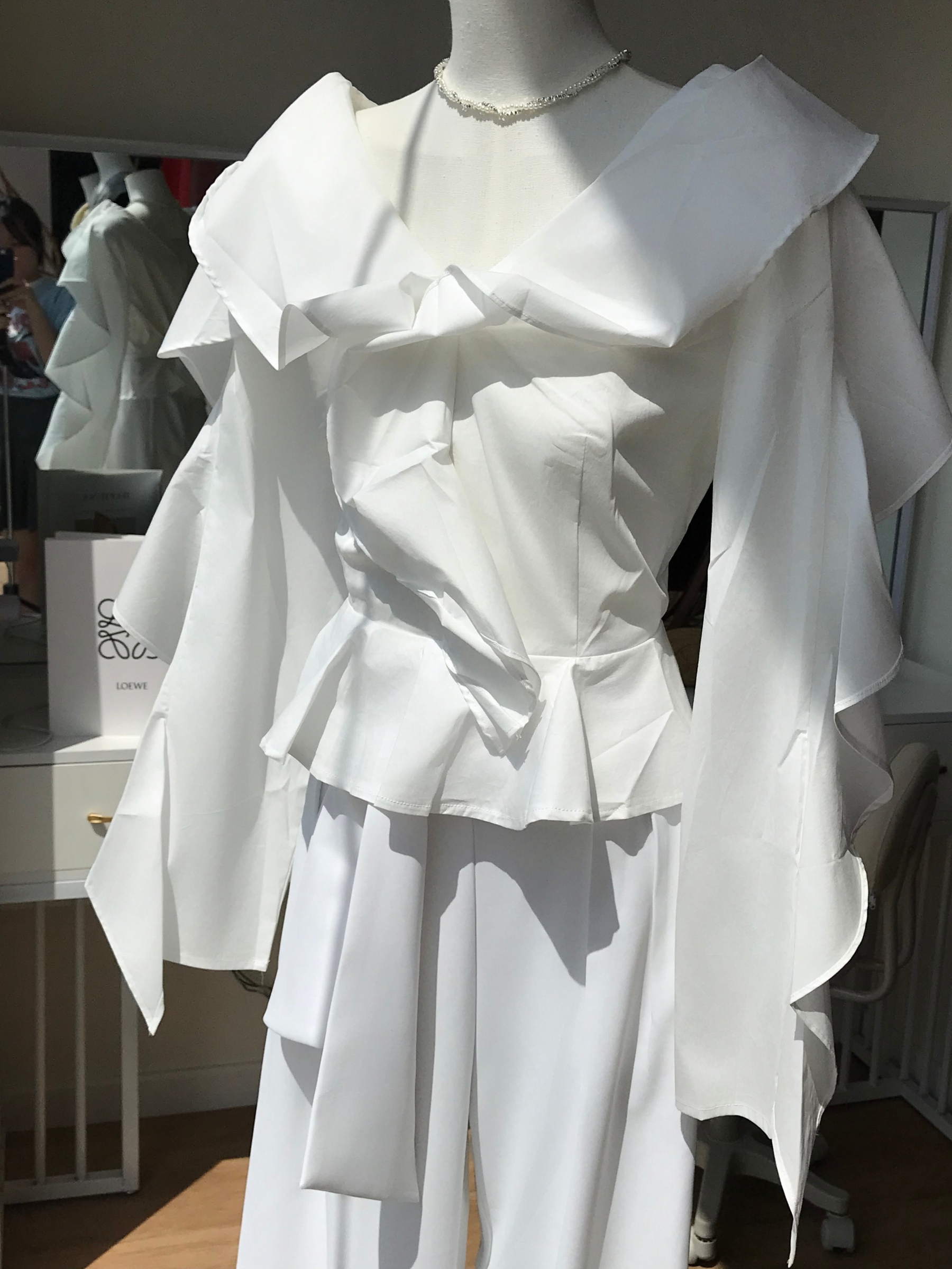 Vixie V-Neck Ruffle Trim Top