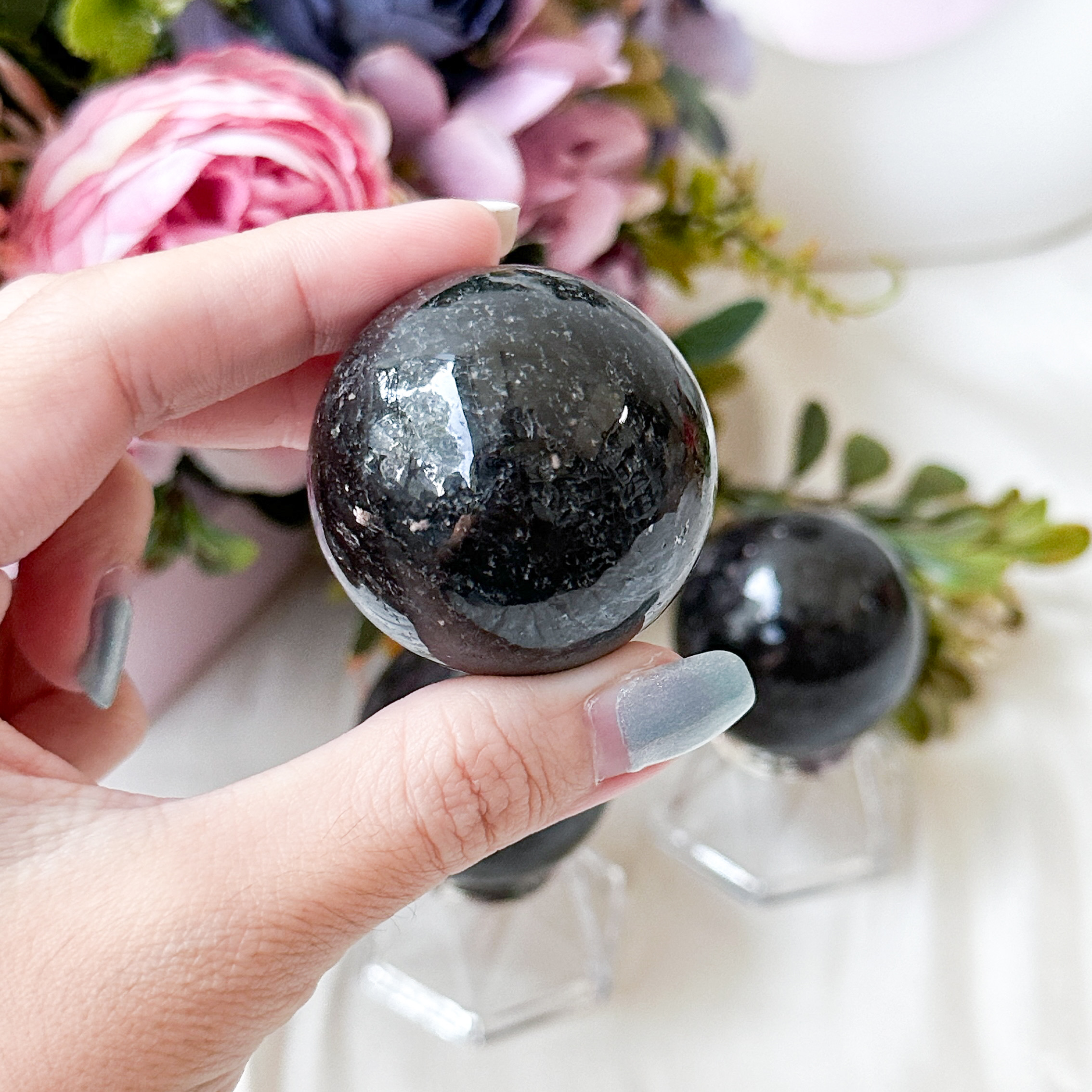 Nuummite 40mm Sphere