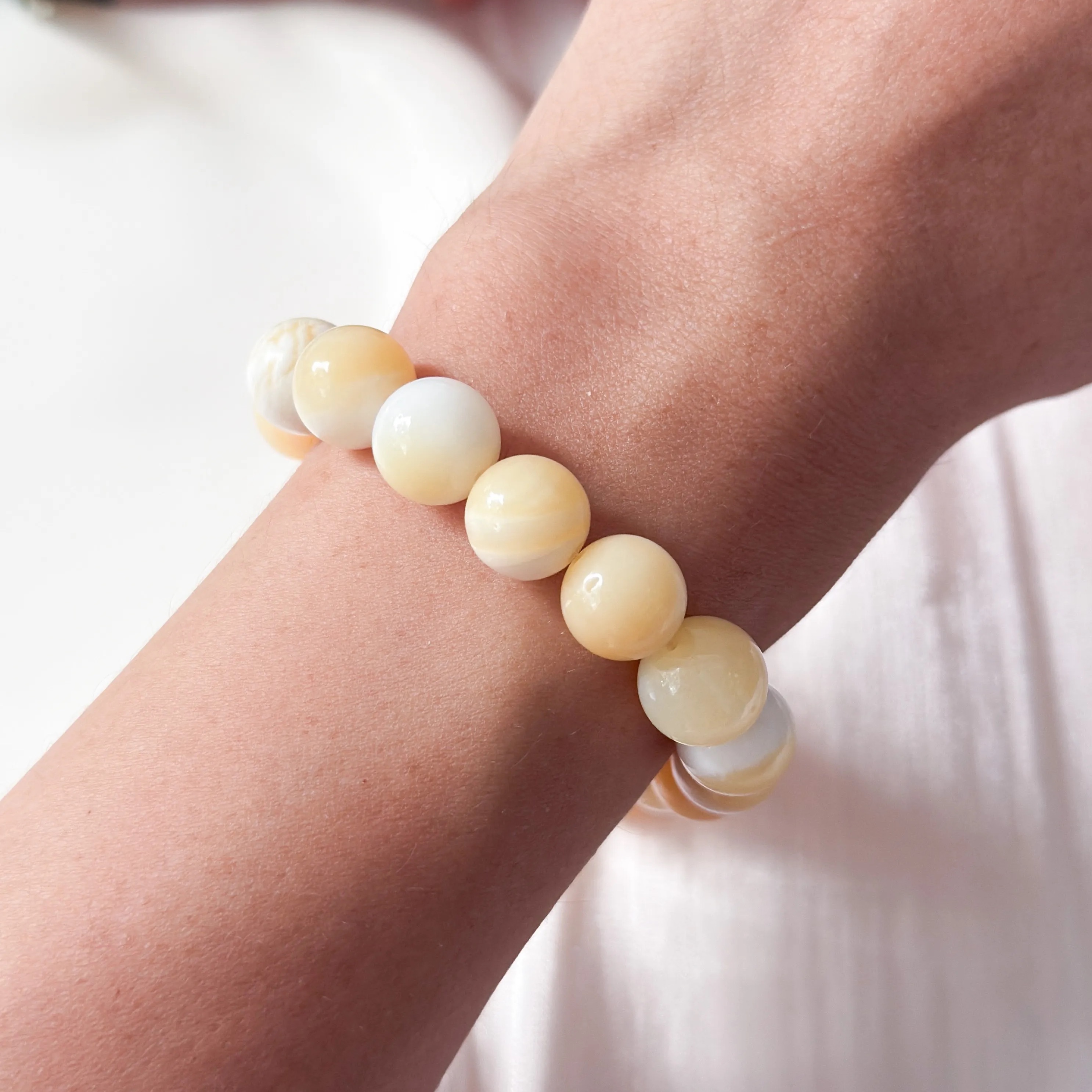 Golden Tridacna Gigas 10mm AA Bracelet