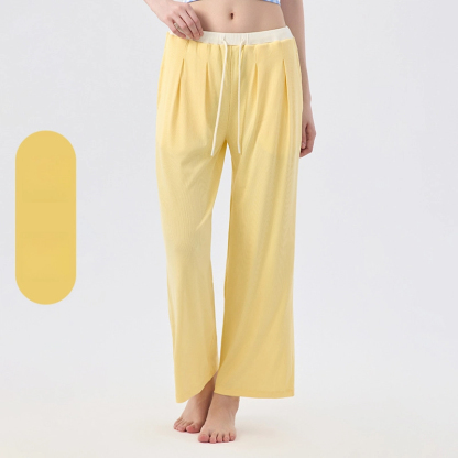 The clouds are loose and cover the hips, And the contrasting color is lazy and wide-leg pants